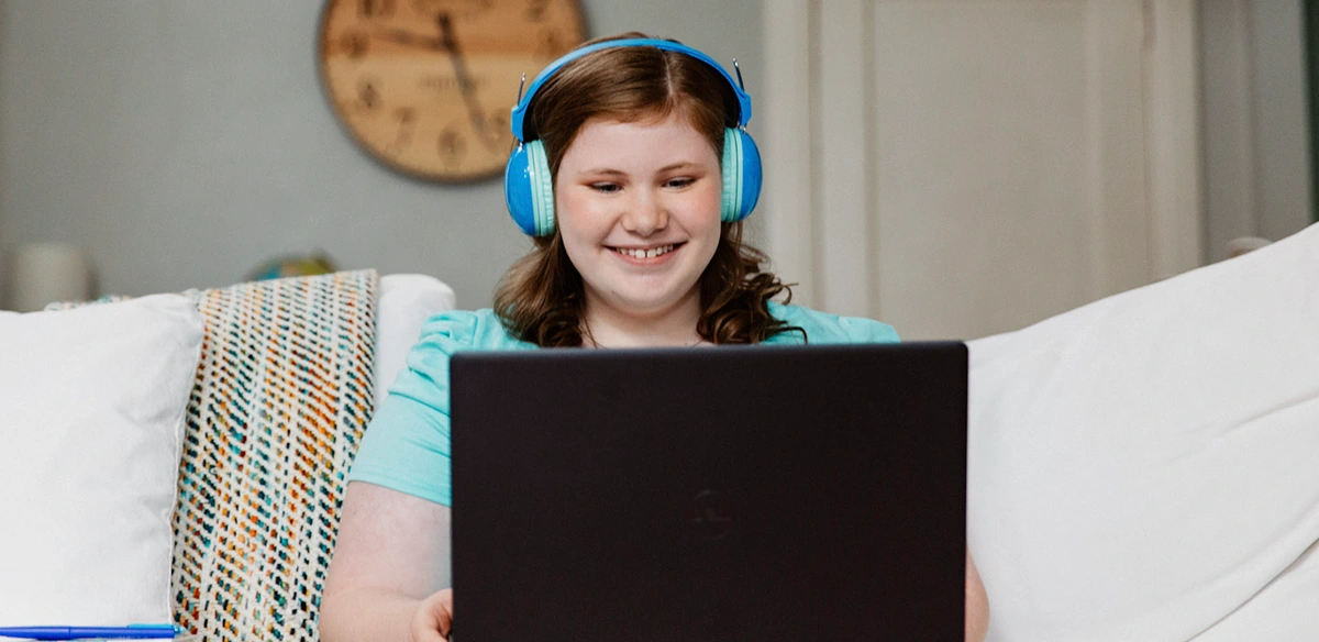 girl studying with headphones